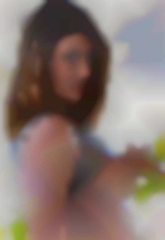 Woman slowly masturbating in bed looking & out.